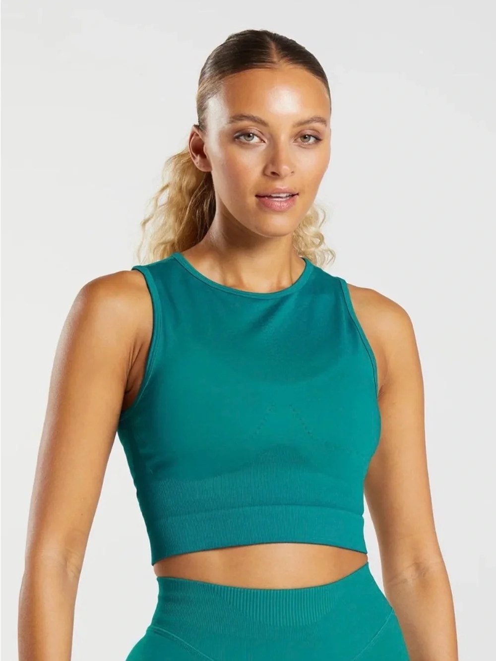 Gymshark seamless crop with back cut out teal green size small